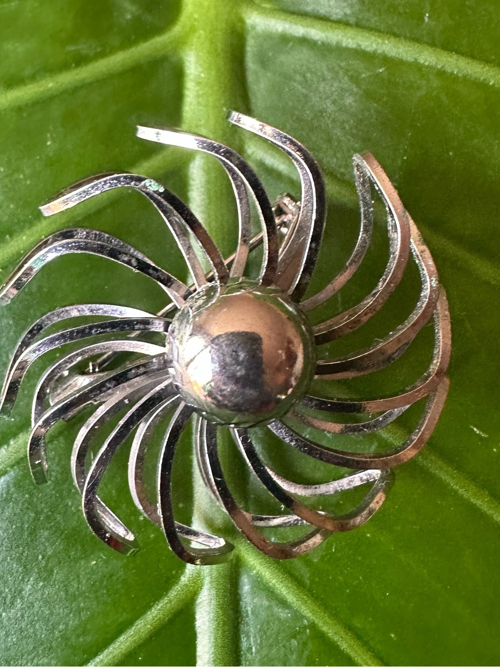 Silver Swirl Sunburst Brooch